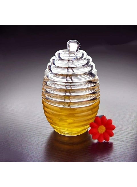 Unbreakable clear acrylic honey jar with a practical dipping tool for kitchen and everyday use.