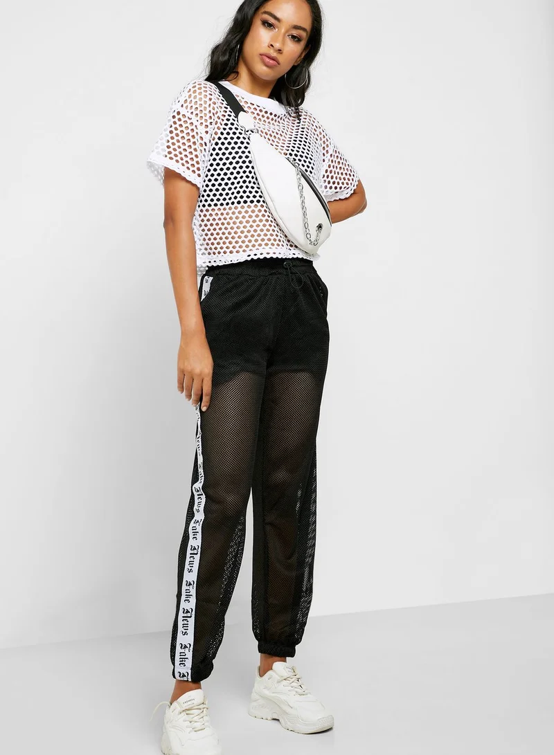 FOREVER 21 Side Slogan Fish Net Jogger Pants