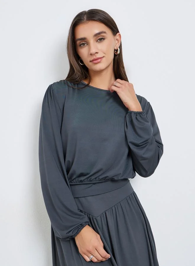 ستايلي طقم منسق من بلوزة سادة وتنورة بخصر عريض