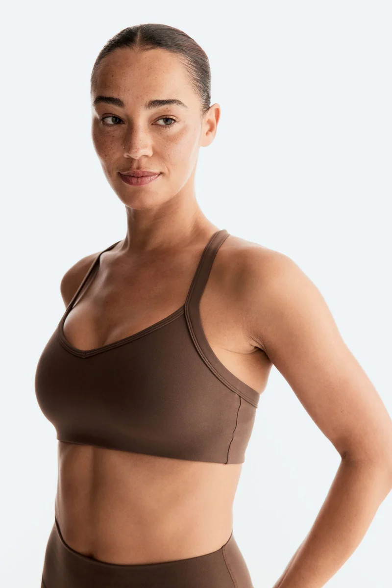 H&M  Medium Support Sports bra with SoftMove™ for Women | Best Price UAE
