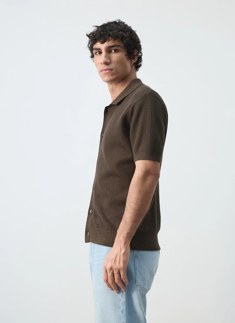 Mango Man  100% cotton structured knit polo with buttons for Men | Best Price UAE