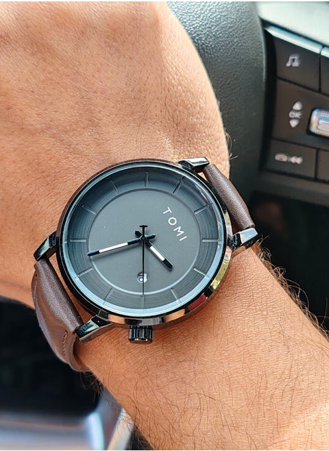 Unisex brown leather analog watch for men and women from TOMI, in addition to the daily date display