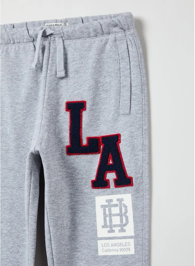 Ovs Plush joggers with patch and printed lettering