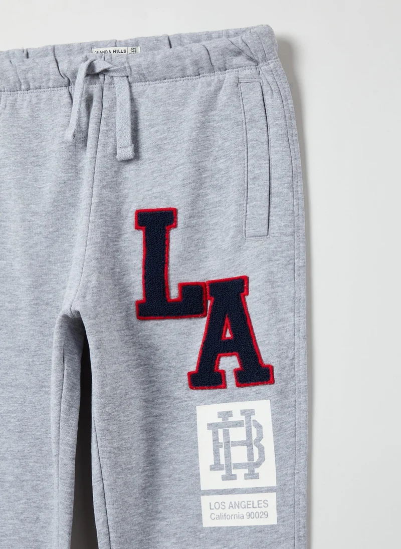Ovs Plush joggers with patch and printed lettering