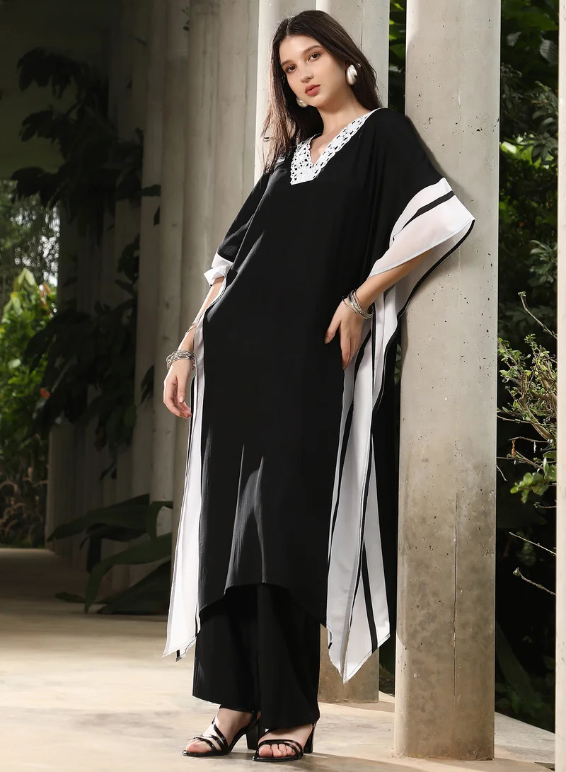 QISSA Women's Midnight Black Panel-Striped Kaftan Kurta Set For Ethnic Wear | V-Neck, Quarter Kimono Sleeves | Stripes Plain Fabric | 2 Piece Kurta Set Designed For Casual & Evening Wear