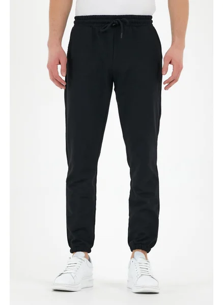 mmetalic Black Men's Sweatpants with Labeled Back and Side Pockets Regular Fit Elastic Legs.