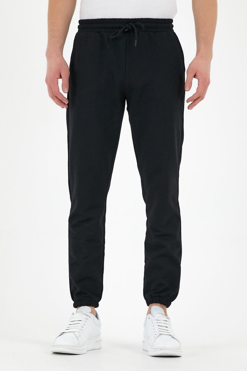 mmetalic Black Men's Sweatpants with Labels, Back and Side Pockets, Regular Fit Elastic Legs.  - Image 1