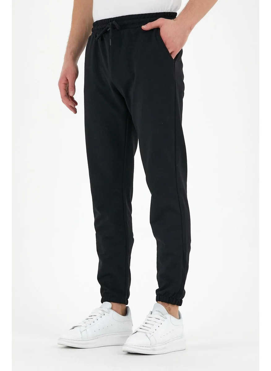 mmetalic Black Men's Sweatpants with Labeled Back and Side Pockets Regular Fit Elastic Legs.