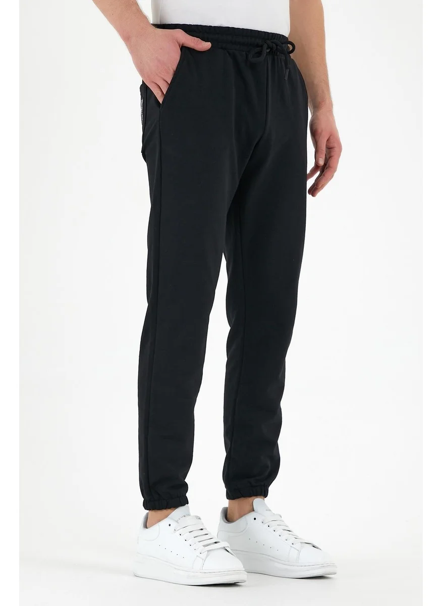mmetalic Black Men's Sweatpants with Labeled Back and Side Pockets Regular Fit Elastic Legs.