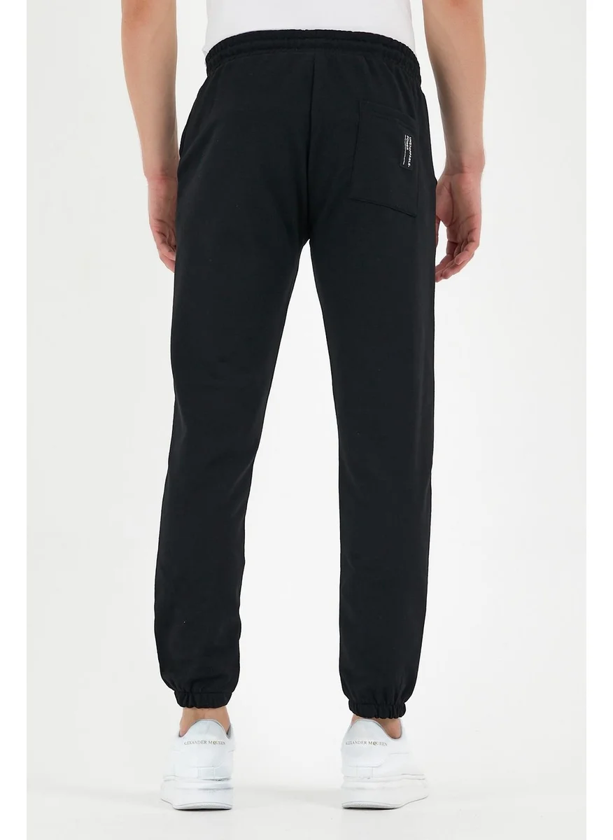 mmetalic Black Men's Sweatpants with Labeled Back and Side Pockets Regular Fit Elastic Legs.