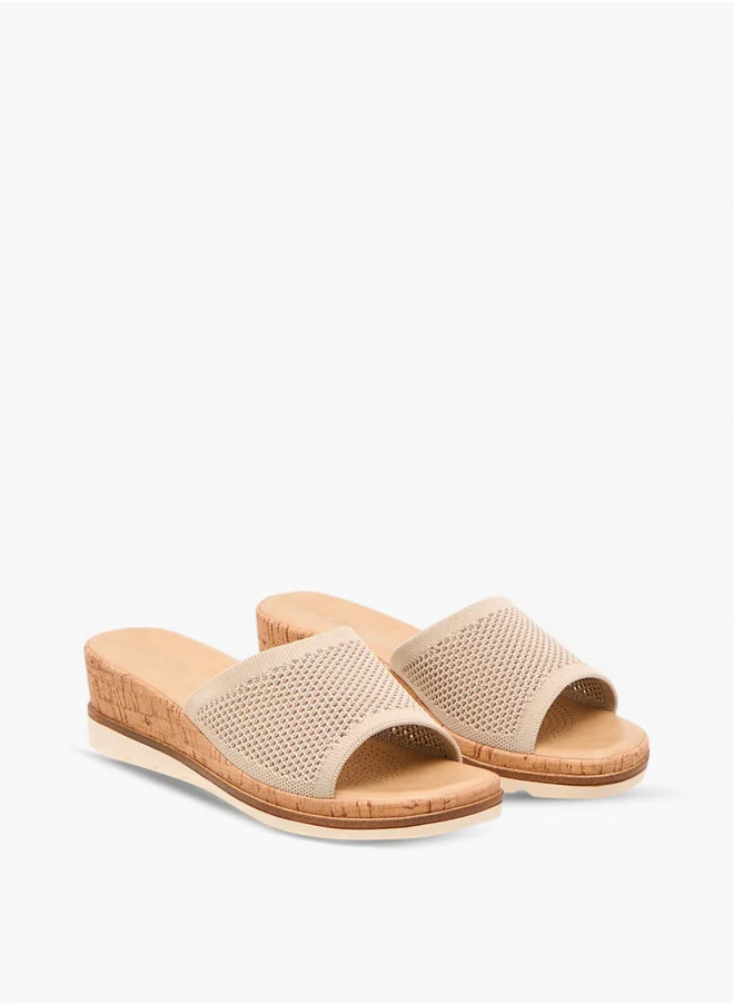 لو كونفورت Flyknit Textured Slip-On Sandals with Wedge Heels