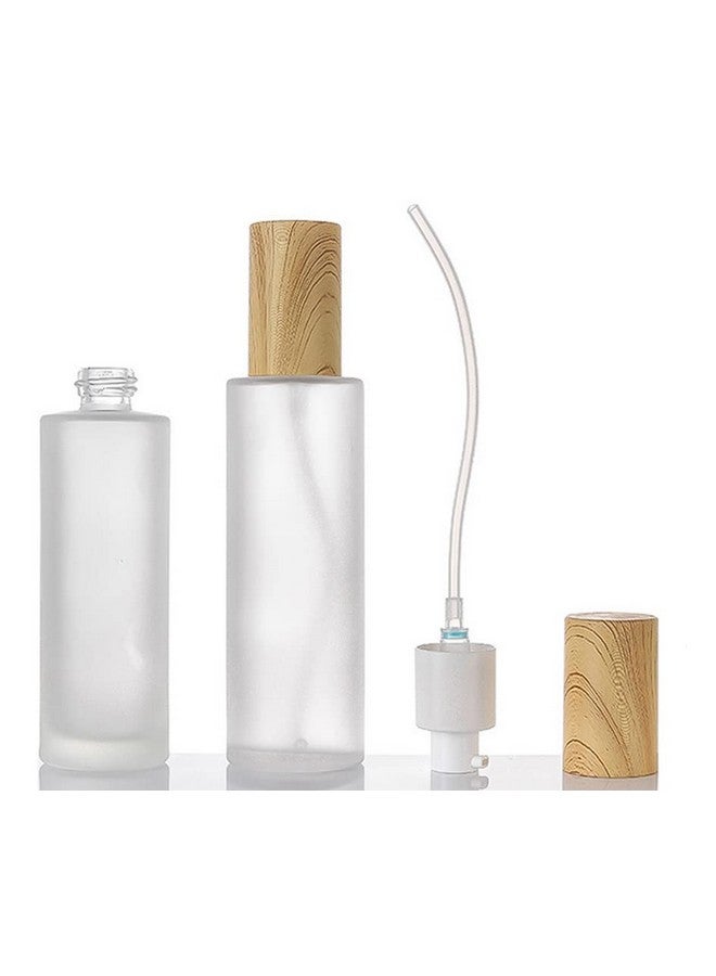 إريوكتري 2 قطعة 120 مل / 4 أونصة زجاجات مضخة زجاجية شفافة فارغة قابلة لإعادة التعبئة وزجاجة كريم لوشن مستحضرات التجميل وزجاجات مضخة وحاوية موزع وعاء مع غطاء من الخشب - Image 1