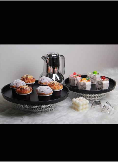 A stand set for sweets, cake, nuts and fruits with a sturdy base that adds a charming touch to the elegance of your home..,