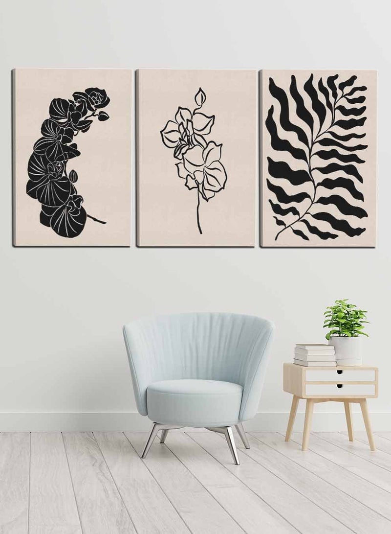 لوحة طقم من ٣ لوحات كانفاس على إطار خشبي بتصميم أوراق نباتية داكنة - Image 1