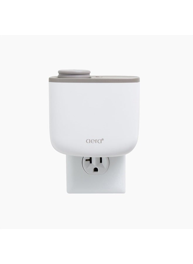 AERA Aera Mini Home Fragrance Diffuser Plug-in: Smart Home App Aroma Control, Essential Oil & Aromatherapy, Hypoallergenic Scent Technology, Safe for Family & Pets, White (Scent Capsules Sold Separately)  - Image 1