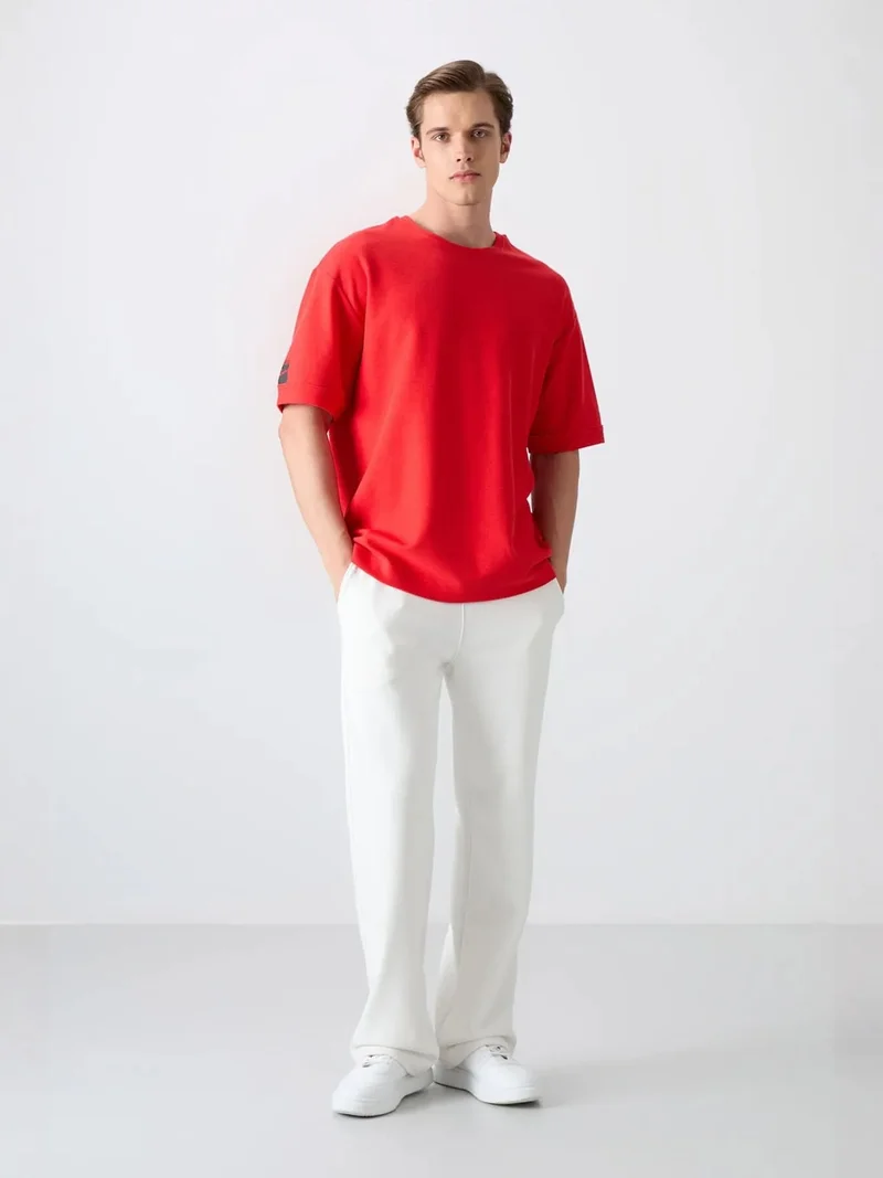 تومي لايف TOMMY Men's Oversized Crew Neck T-Shirt With Patch