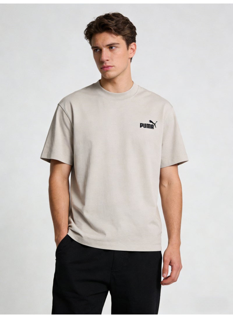 بوما PUMA Men's Relaxed Fit Crew Neck T-Shirt, Light Beige Cotton Tee with Iconic Black Logo - Image 1