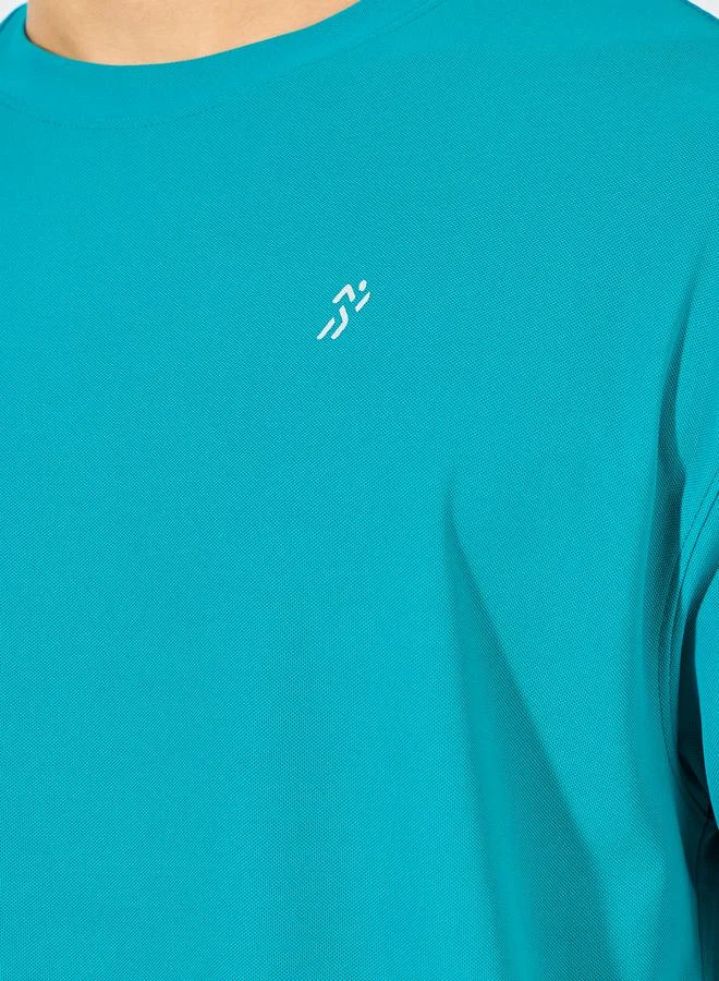 Styli Micro Pique Knit Oversized T-Shirt with Reflective Logo