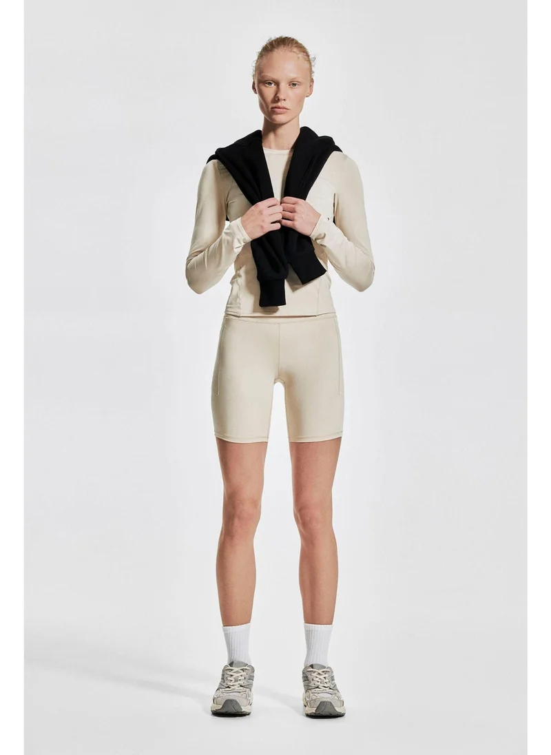 H&M Pocket-detail sports cycling shorts in DryMove™