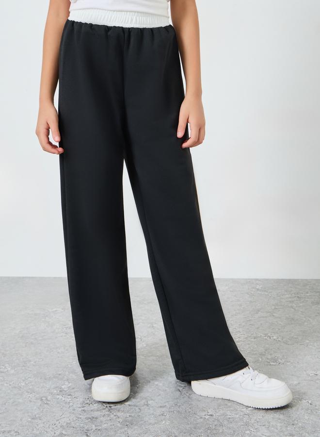 ستايلي بنطلون رياضي جوغر أسود بأرجل واسعة - Image 1