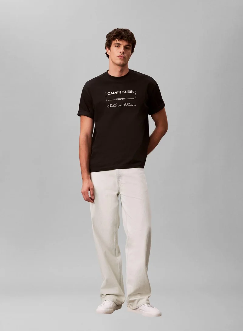 Calvin Klein Jeans Black Dual Logo Graphic Relaxed T-Shirt for Men | Best Price UAE