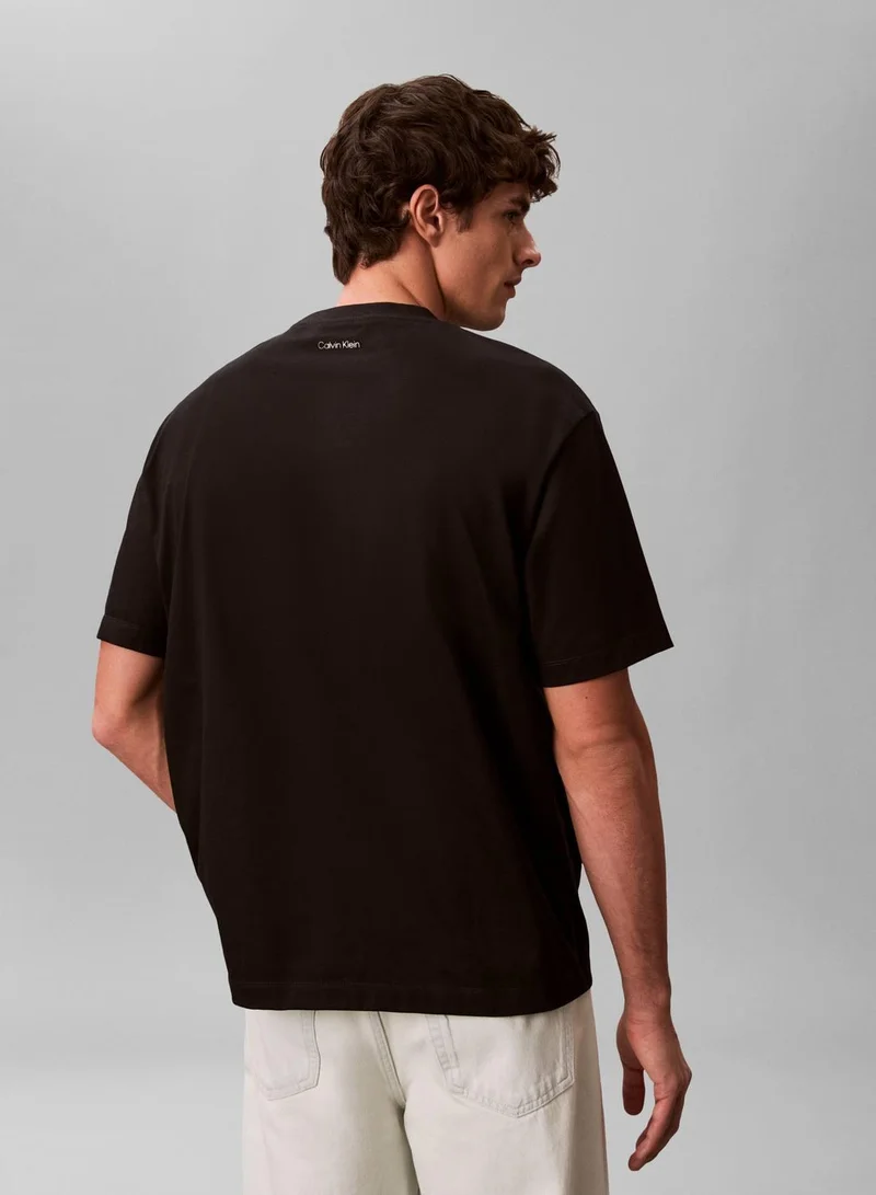 Calvin Klein Jeans Black Dual Logo Graphic Relaxed T-Shirt for Men | Best Price UAE