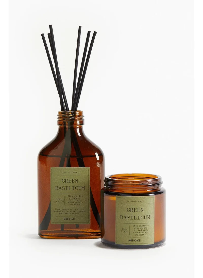 اتش اند ام Small scented candle in glass holder