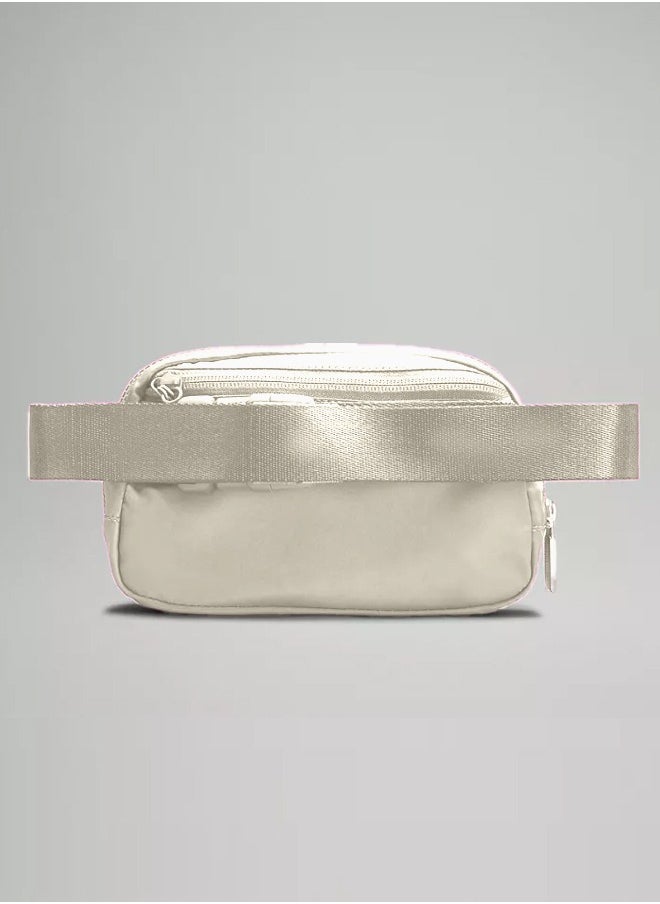 Lululemon Everywhere Belt Bag, Compact and Convenient Belly Bag with Zippered Pockets, Easy Access Exterior Pocket and Interior Essentials Pocket for On the Go Storage, Cream  - Image 2