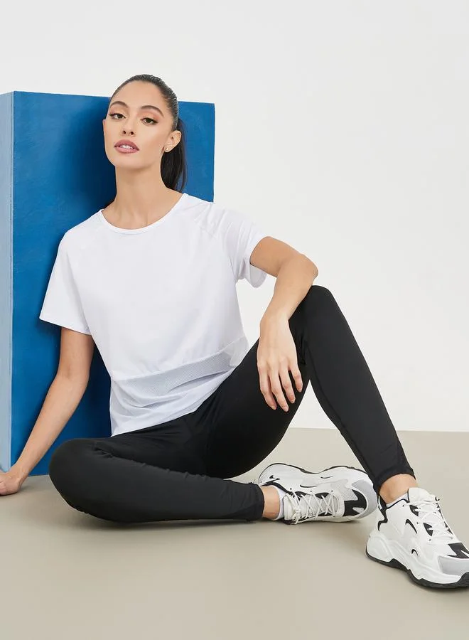 ستايلي Cut Out Back Mesh Detail Top and Stitch Detail Active Legging Set
