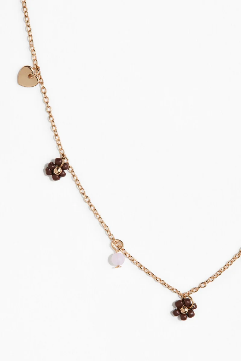 اتش اند ام قلادة مع حلية