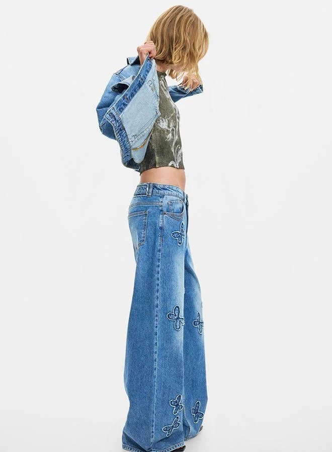 Desigual Blue Wide-leg printed jeans for Women | Best Price UAE