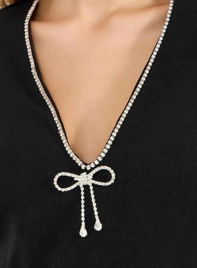 ستايلي فستان ميدي سادة مُرصع بالأحجار