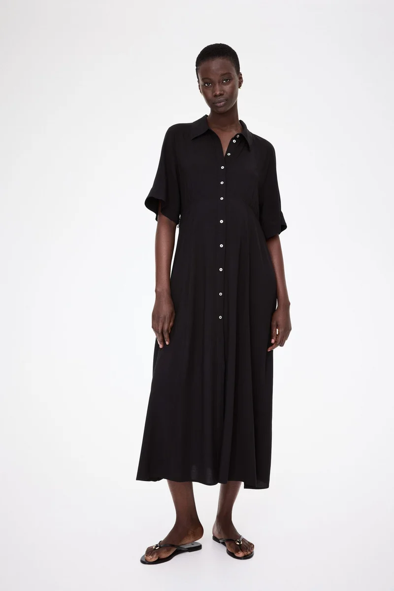 اتش اند ام فستان بقصّة قميص لفترة الحمل وما بعدها من تشكيلة ماما