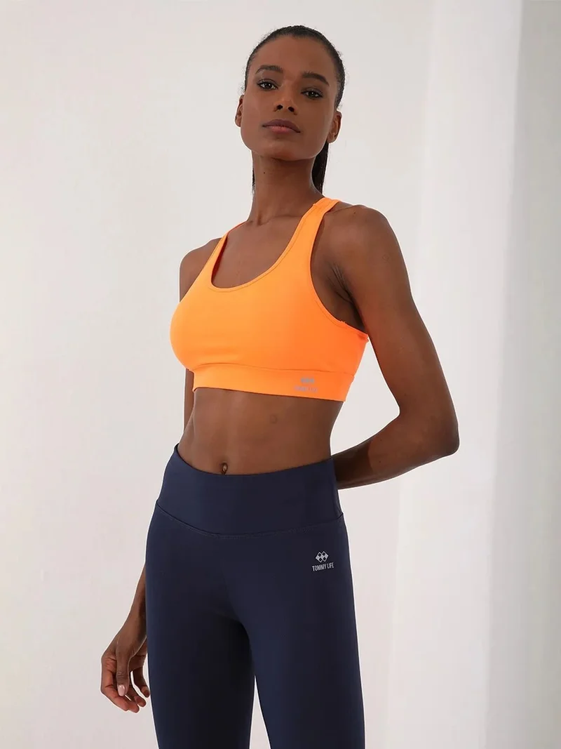 تومي لايف TOMMY Sleeveless Cropped Fitted Sports Top