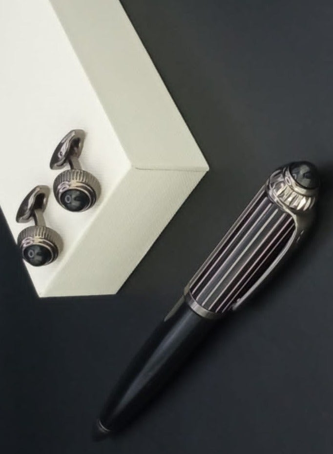 A luxurious and elegant pen and cufflink set with a box