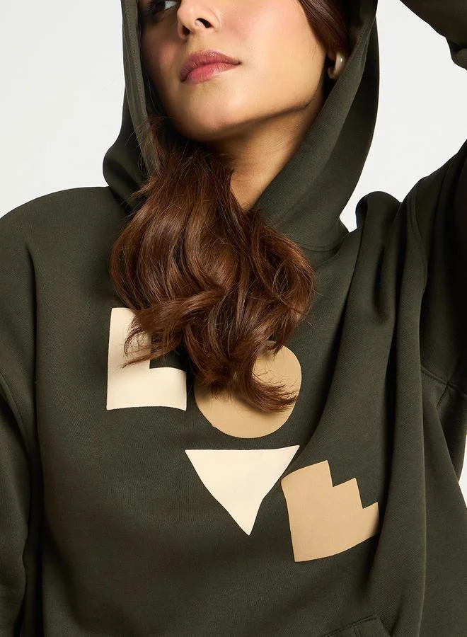 Femmella  Olive Oversized Graphic Hoodie for Women | Best Price UAE