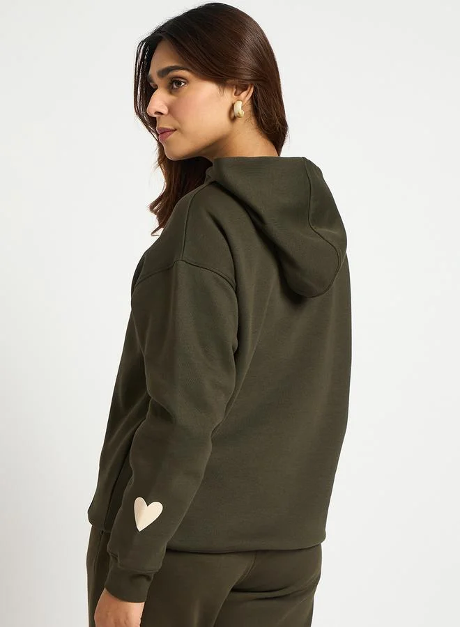 Femmella  Olive Oversized Graphic Hoodie for Women | Best Price UAE