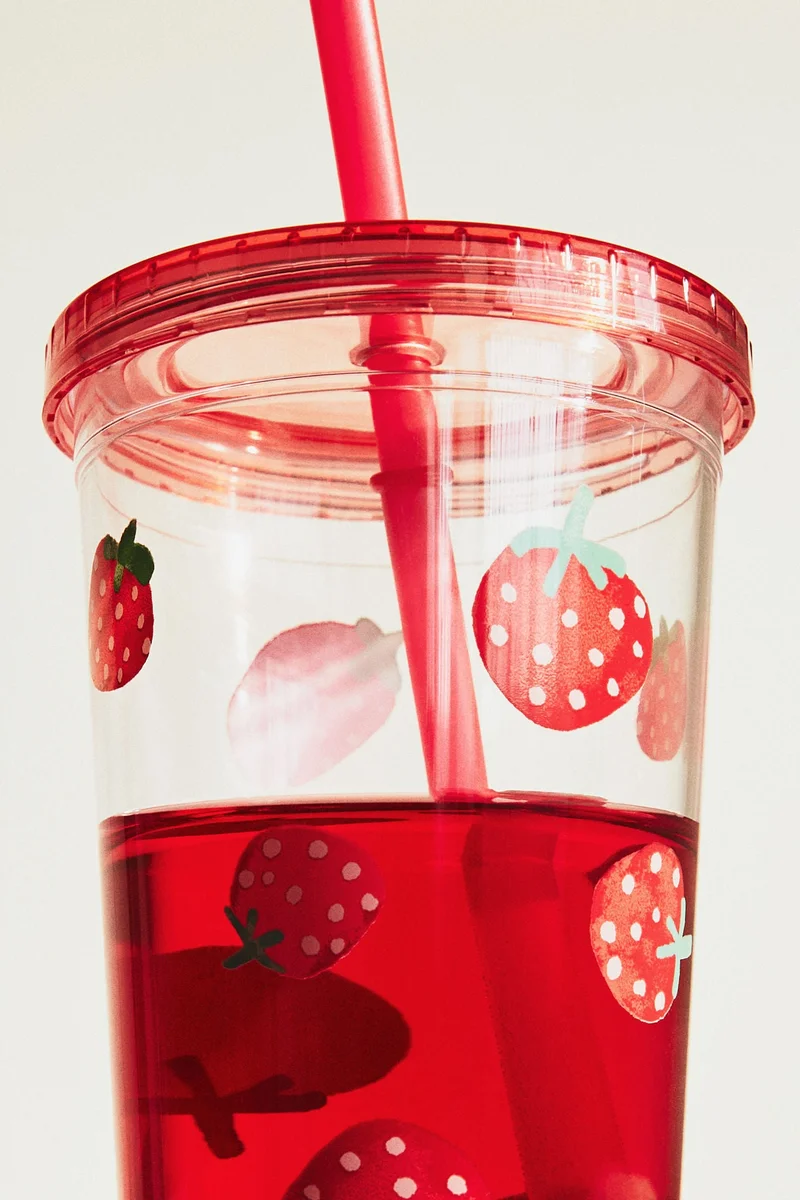 H&M Patterned plastic mug with a straw
