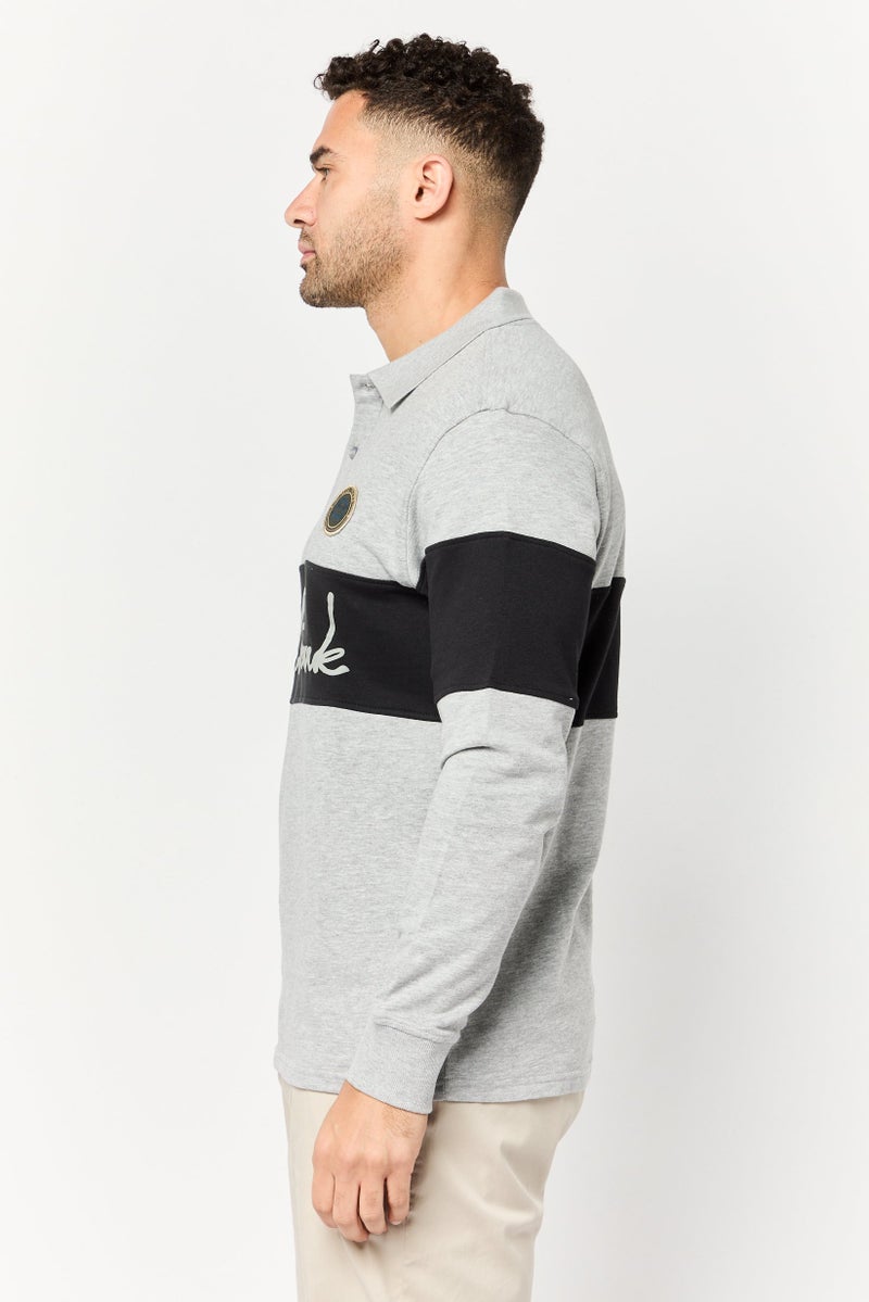 Paul Frank قميص بولو بأكمام طويلة للرجال بتصميم عادي مع شعار العلامة التجارية، متعدد الألوان - Image 3