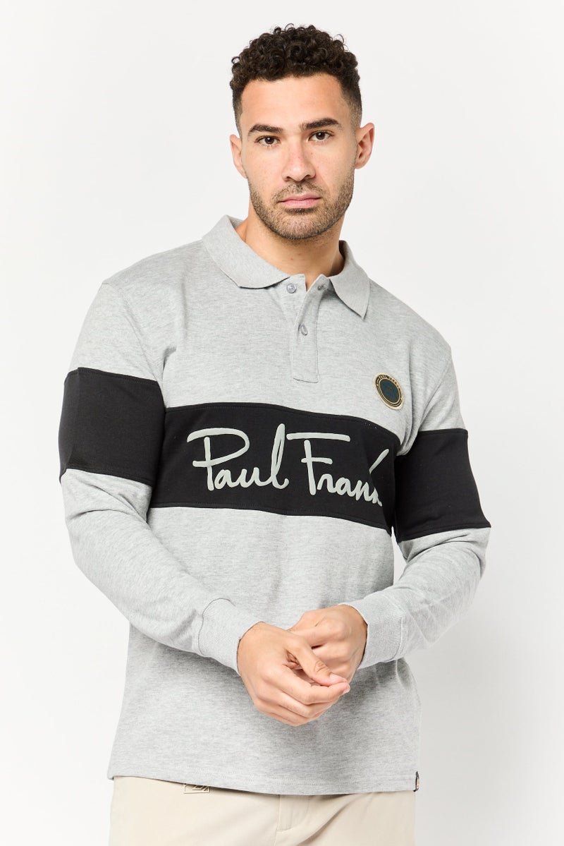 Paul Frank قميص بولو بأكمام طويلة للرجال بتصميم عادي مع شعار العلامة التجارية، متعدد الألوان - Image 1