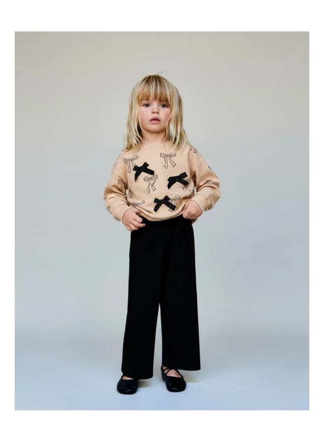 Magu Girls' Cotton Beige Bow-Patterned Sweatshirt and Black Pants Set – Stylish and Comfortable Outfit
