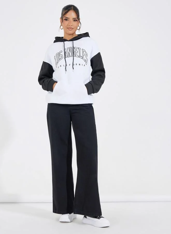 Styli Styli Oversized Longline Color Block Slogan Hoodie