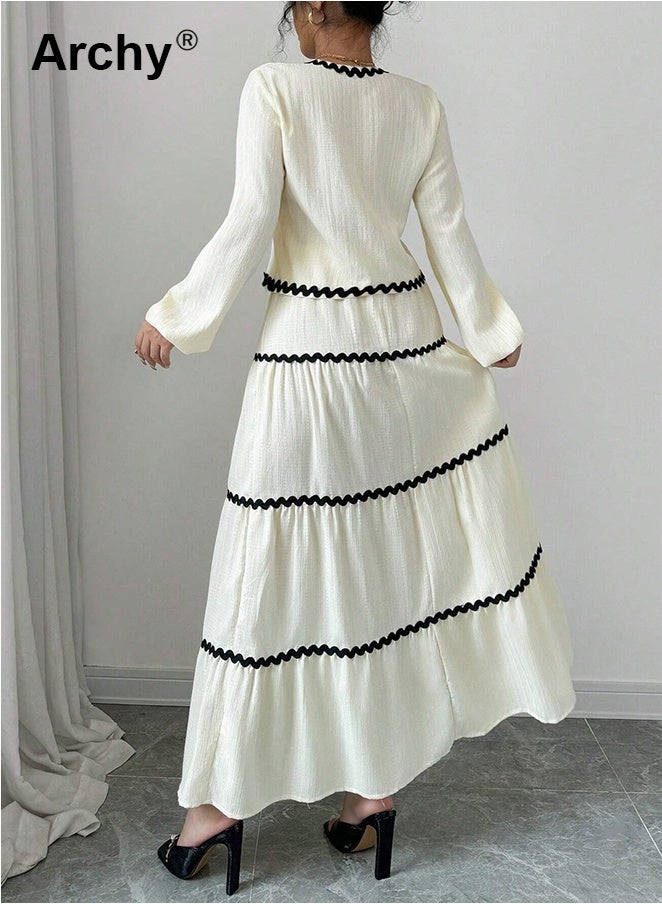 أرشي طقم فستان وتنورة أنيقان على الطراز الفرنسي بأكمام فانوس مكشكشة وعقدة فيونكة، مكون من قطعتين. بلوزة بأكمام فانوس مكشكشة وعقدة فيونكة، وتنورة مطوية متعددة الطبقات | طقم تنسيق أنيق بطابع ريفي وحلو فرنسي. - Image 4