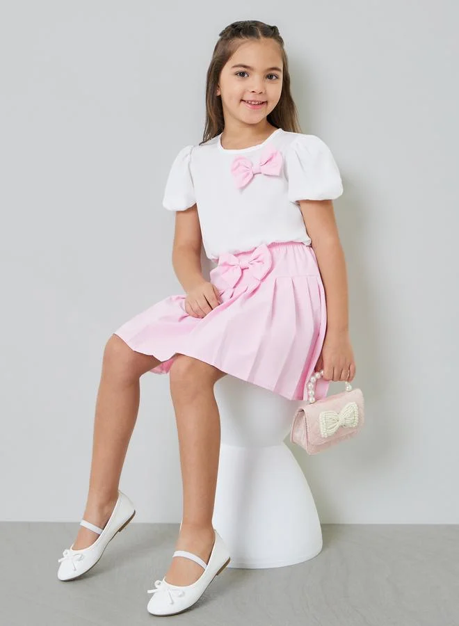 ستايلي Girls Bow Detail Puff Sleeve Blouse and Pleated Skirt Set