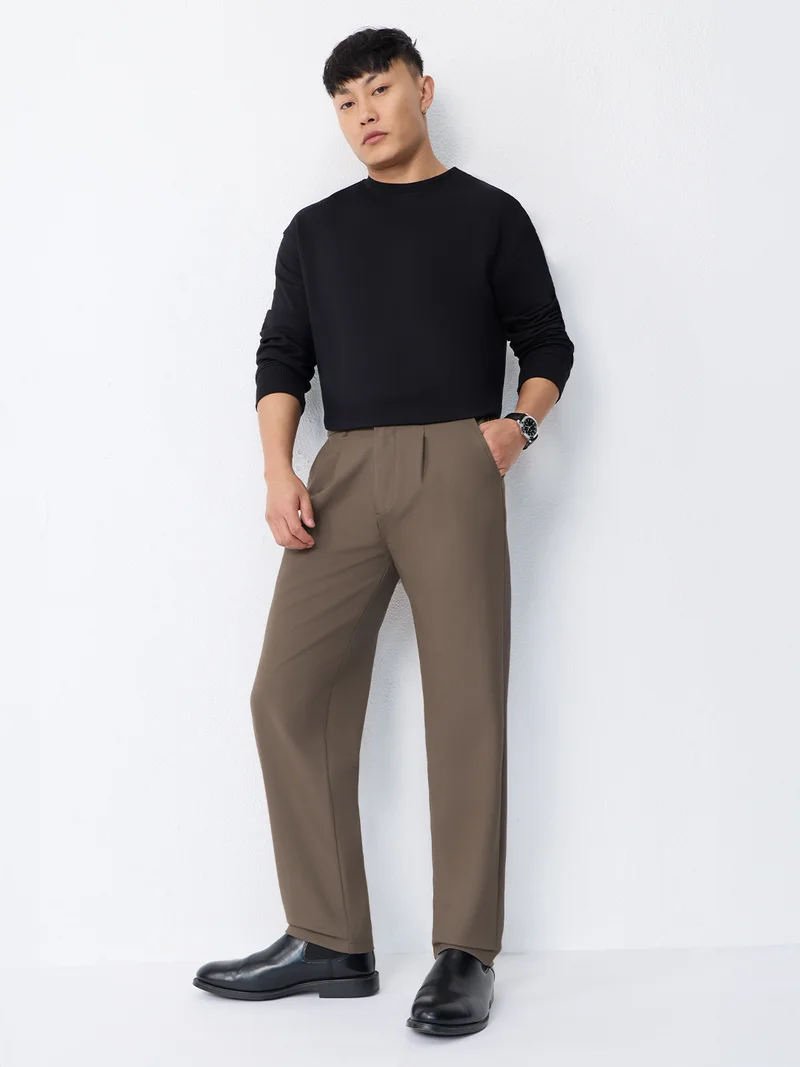 The Souled Store  The Souled Store Super Flex Pants: Men and Boys Sienna Brown Solid Polyester Viscose Elastane Blend Straight Fit Elastic Back Waistband Pleated Front Trousers  | Best Price UAE