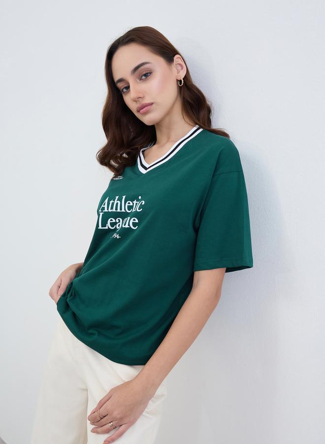 Styli Green Varsity Slogan Oversized T-Shirt - Image 1