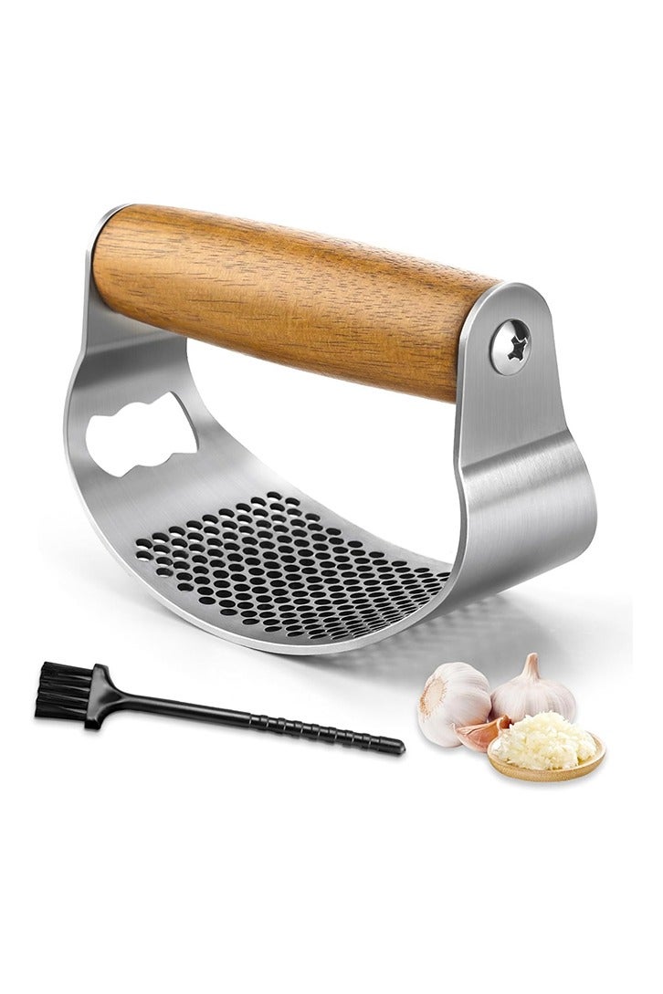 Garlic press rocker, crusher, mincer tool stainless steel with a Garlic Peeler, spatula, and Brush extract more Garlic Paste. The Garlic Mincer Tool Squeezes, Extracts, Crushes - Image 1