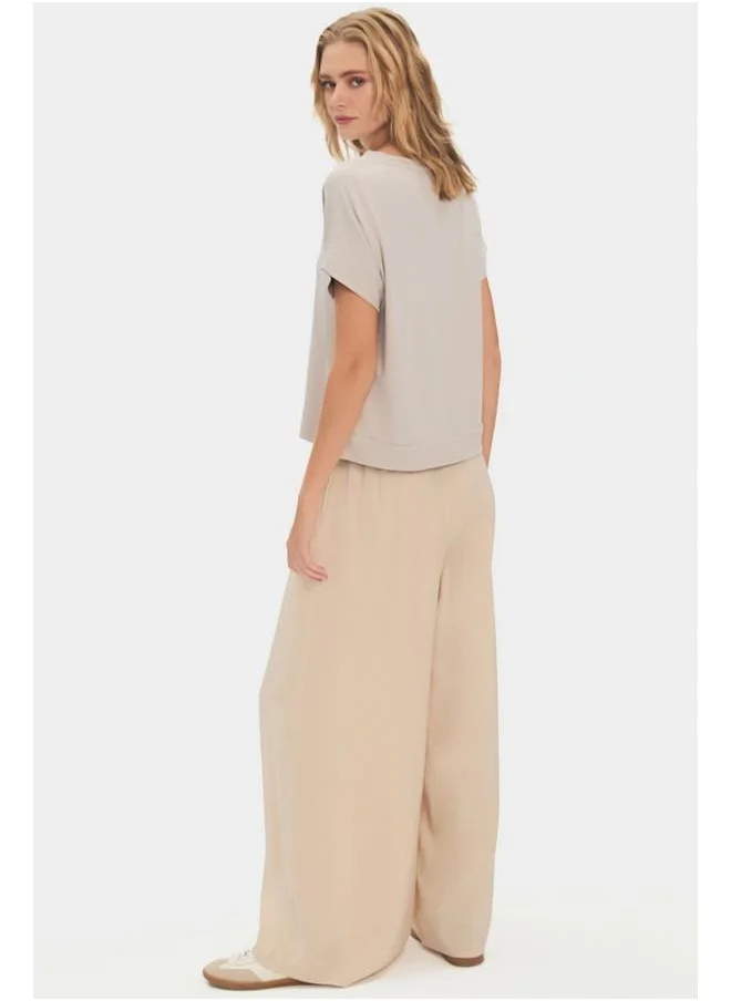 جون June Elastic Waist Flowy Trouser Stone