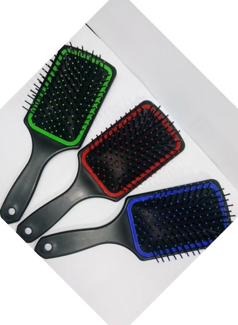 Large rectangular padded hairbrush with a plastic handle for styling hair, available in multiple colors. - Image 2