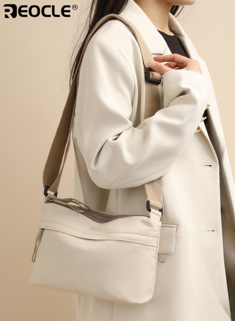 REOCLE Women's Canvas Crossbody Bag with 6 Pocket Design and Adjustable Strap Small Shoulder Purse with Phone compartment for Casual Travel Use - Image 1